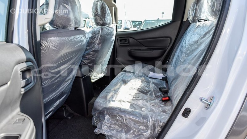 Big with watermark mitsubishi l200 bumthang import dubai 2339