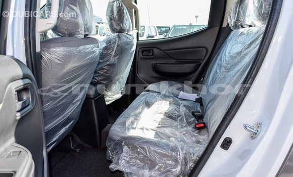 Buy Import Mitsubishi L200 White Car in Import - Dubai in Bumthang Buy Import Mitsubishi L200 White Car in Import - Dubai in Bumthang