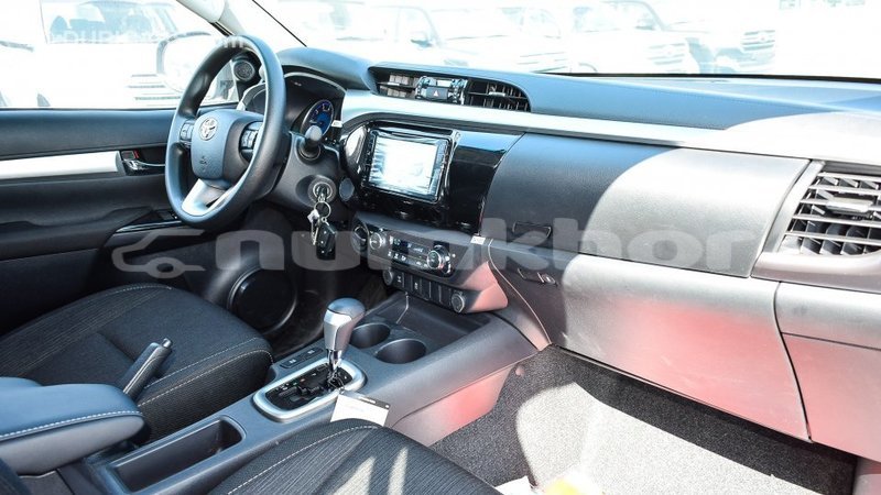 Big with watermark toyota hilux bumthang import dubai 2340