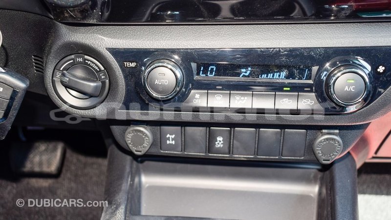 Big with watermark toyota hilux bumthang import dubai 2340