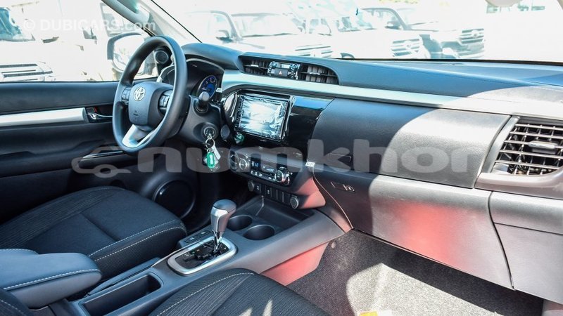 Big with watermark toyota hilux bumthang import dubai 2341