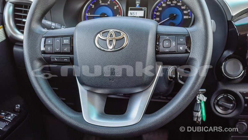 Big with watermark toyota hilux bumthang import dubai 2341
