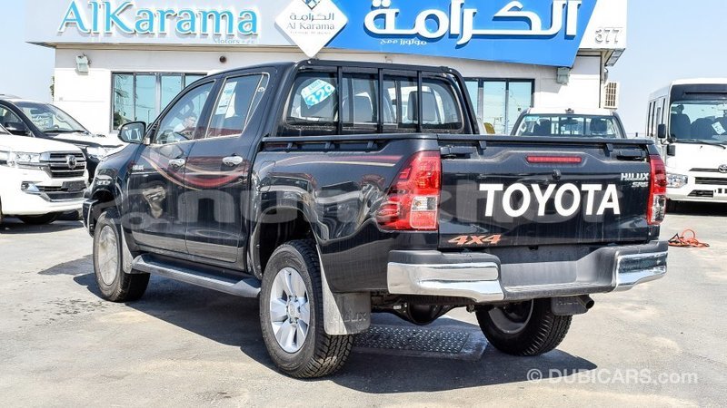 Big with watermark toyota hilux bumthang import dubai 2341