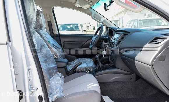 Buy Import Mitsubishi L200 White Car in Import - Dubai in Bumthang Buy Import Mitsubishi L200 White Car in Import - Dubai in Bumthang