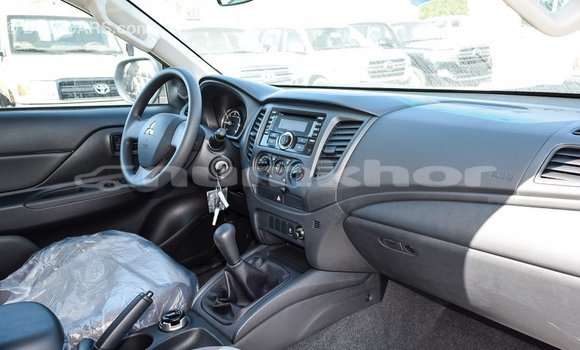 Buy Import Mitsubishi L200 White Car in Import - Dubai in Bumthang Buy Import Mitsubishi L200 White Car in Import - Dubai in Bumthang