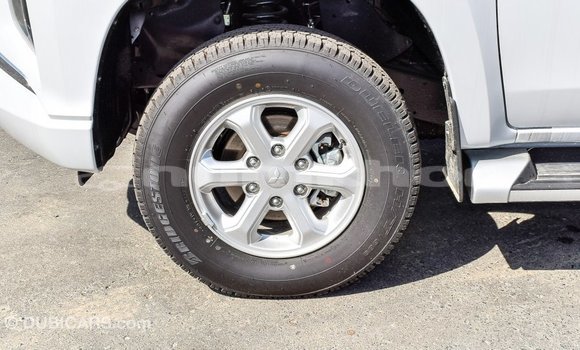Buy Import Mitsubishi L200 White Car in Import - Dubai in Bumthang Buy Import Mitsubishi L200 White Car in Import - Dubai in Bumthang