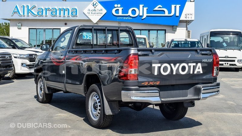 Big with watermark toyota hilux bumthang import dubai 2344