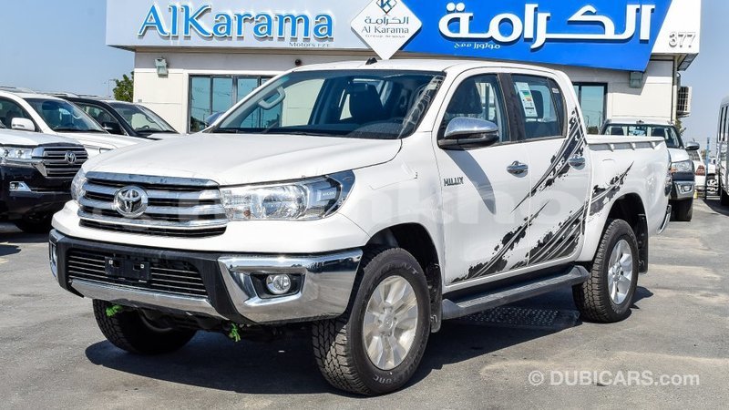 Big with watermark toyota hilux bumthang import dubai 2347
