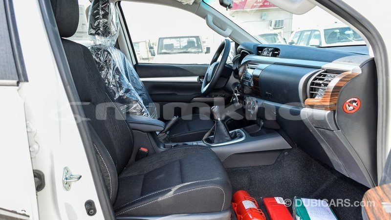 Big with watermark toyota hilux bumthang import dubai 2347