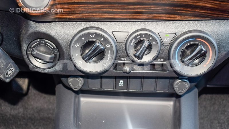 Big with watermark toyota hilux bumthang import dubai 2347