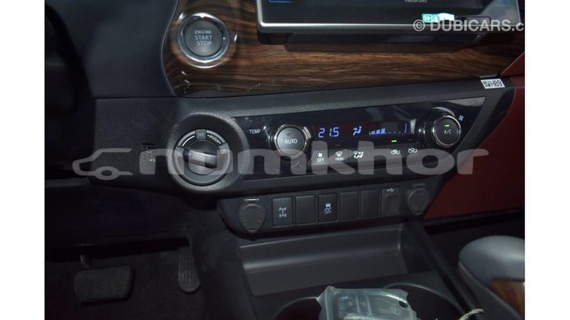 Big with watermark toyota hilux bumthang import dubai 2353