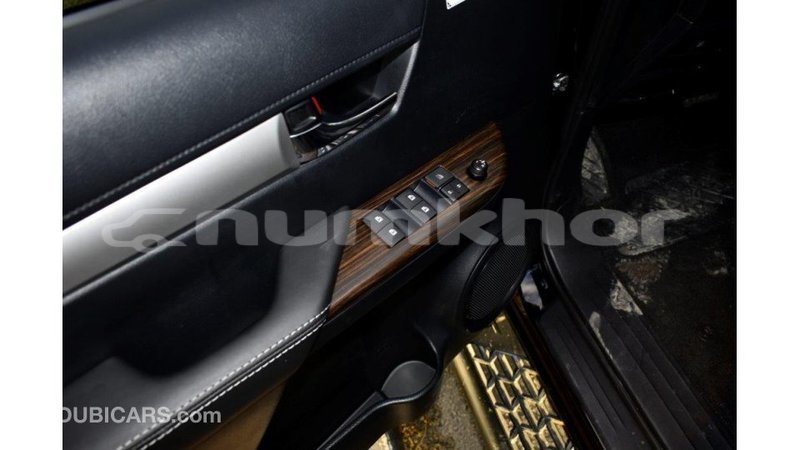 Big with watermark toyota hilux bumthang import dubai 2353