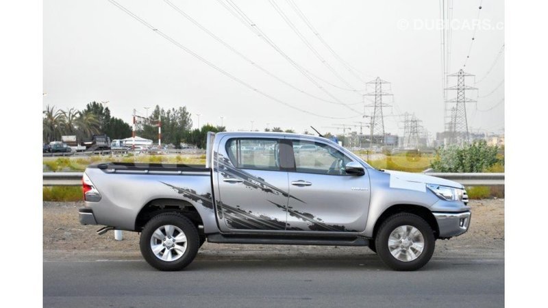 Big with watermark toyota hilux bumthang import dubai 2380