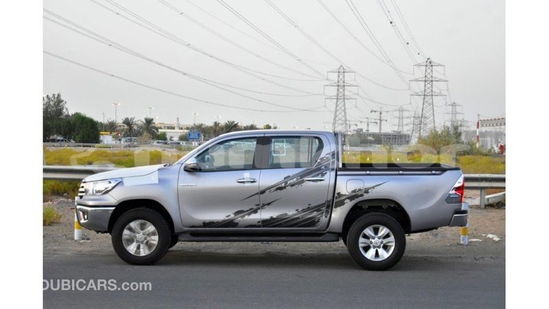 Big with watermark toyota hilux bumthang import dubai 2380