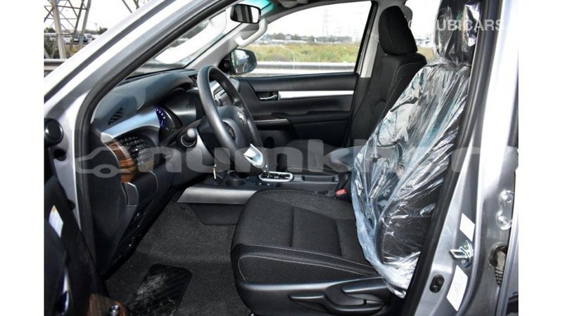 Big with watermark toyota hilux bumthang import dubai 2380