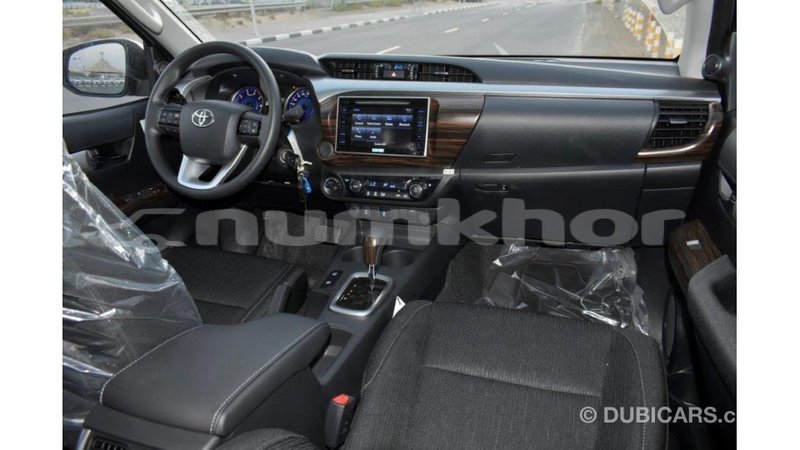 Big with watermark toyota hilux bumthang import dubai 2380