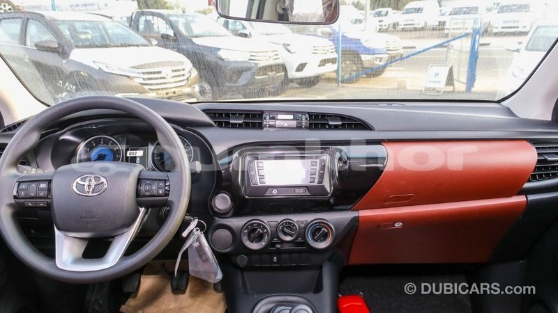 Big with watermark toyota hilux bumthang import dubai 2395