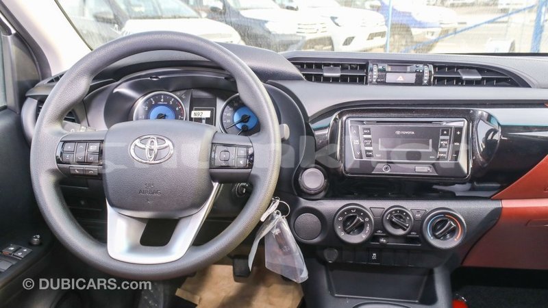Big with watermark toyota hilux bumthang import dubai 2395