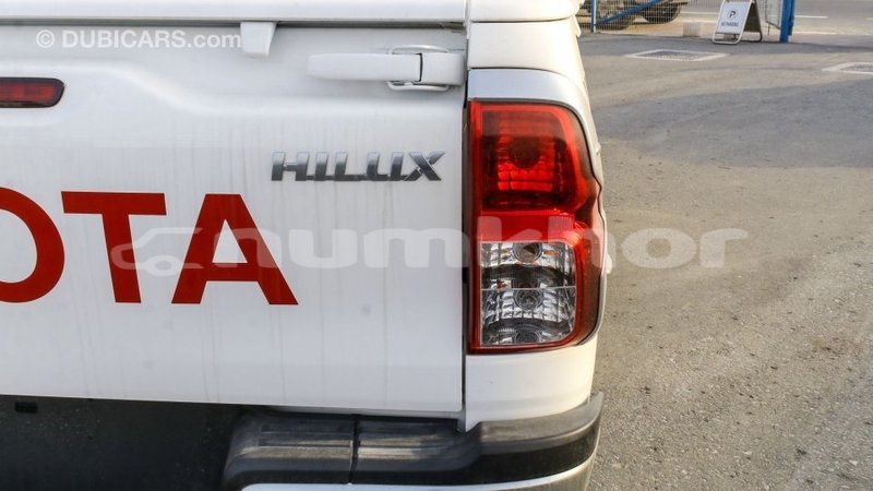 Big with watermark toyota hilux bumthang import dubai 2395