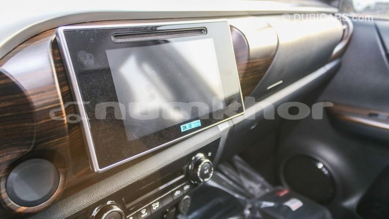 Big with watermark toyota hilux bumthang import dubai 2396