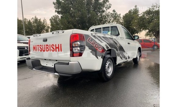 Buy Import Mitsubishi L200 White Car in Import - Dubai in Bumthang Buy Import Mitsubishi L200 White Car in Import - Dubai in Bumthang