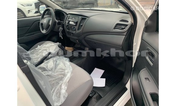 Buy Import Mitsubishi L200 White Car in Import - Dubai in Bumthang Buy Import Mitsubishi L200 White Car in Import - Dubai in Bumthang
