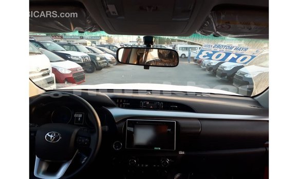 Buy Import Toyota Hilux Red Car in Import - Dubai in Bumthang Buy Import Toyota Hilux Red Car in Import - Dubai in Bumthang