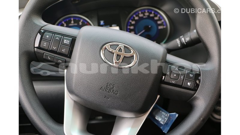Big with watermark toyota hilux bumthang import dubai 2538