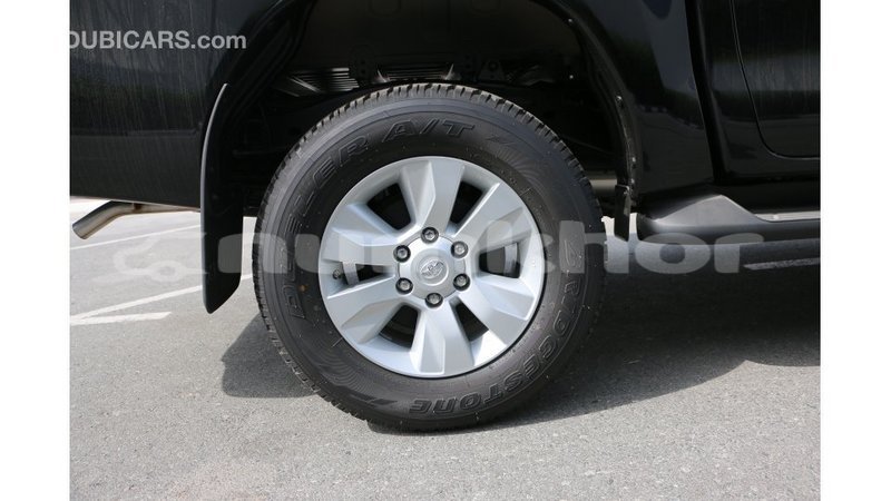 Big with watermark toyota hilux bumthang import dubai 2538