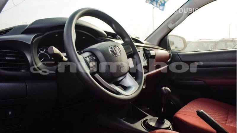 Big with watermark toyota hilux bumthang import dubai 2543