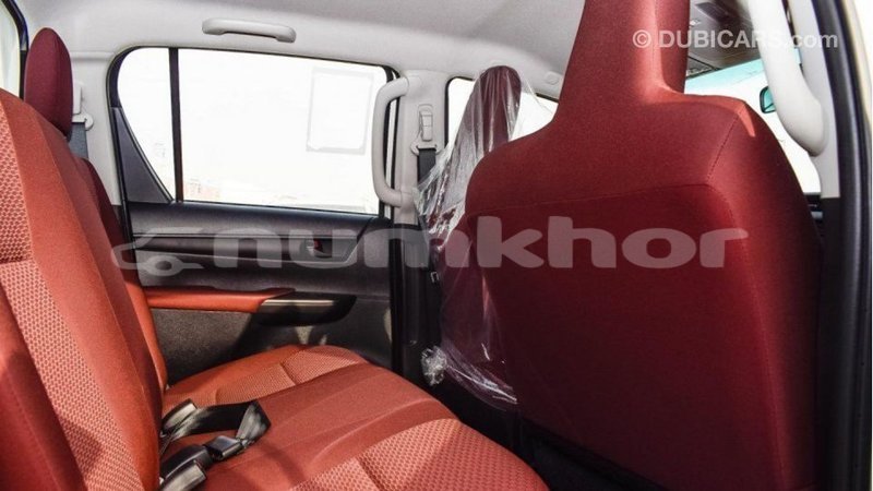 Big with watermark toyota hilux bumthang import dubai 2543
