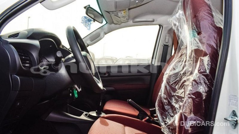 Big with watermark toyota hilux bumthang import dubai 2543