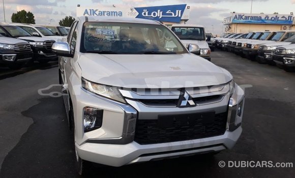 Buy Import Mitsubishi L200 White Car in Import - Dubai in Bumthang Buy Import Mitsubishi L200 White Car in Import - Dubai in Bumthang