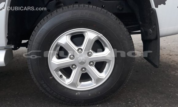 Buy Import Mitsubishi L200 White Car in Import - Dubai in Bumthang Buy Import Mitsubishi L200 White Car in Import - Dubai in Bumthang