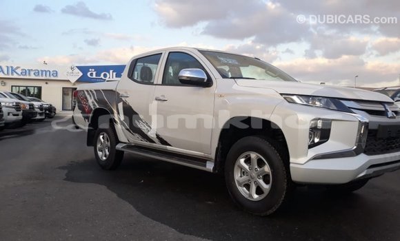 Buy Import Mitsubishi L200 White Car in Import - Dubai in Bumthang Buy Import Mitsubishi L200 White Car in Import - Dubai in Bumthang