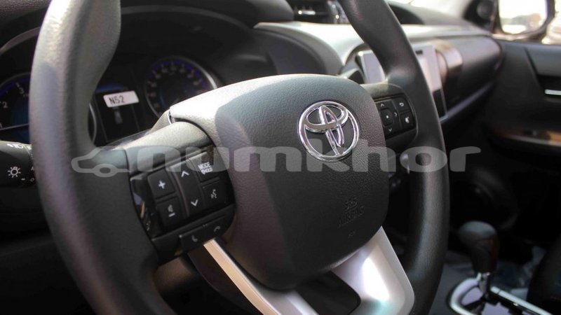 Big with watermark toyota hilux bumthang import dubai 2598