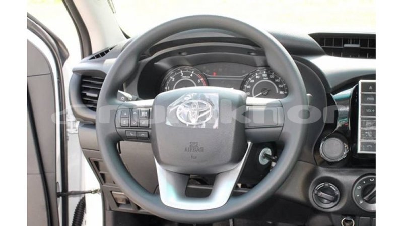 Big with watermark toyota hilux bumthang import dubai 2652