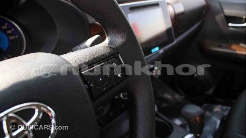 Big with watermark toyota hilux bumthang import dubai 2669