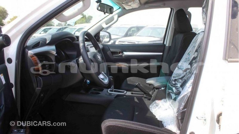 Big with watermark toyota hilux bumthang import dubai 2669