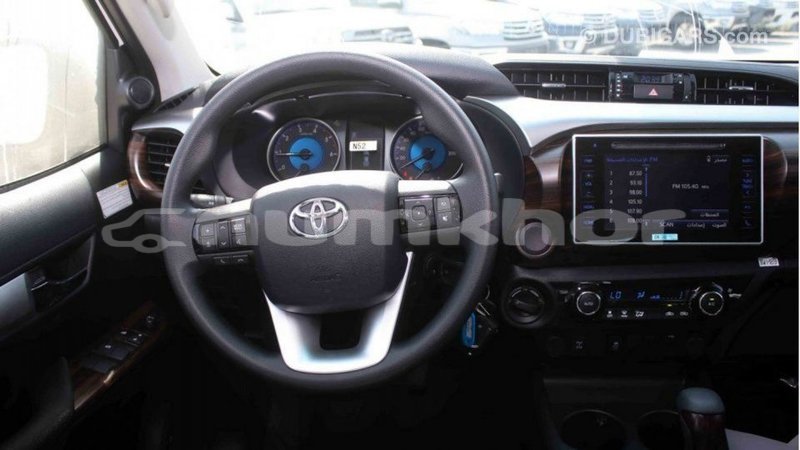 Big with watermark toyota hilux bumthang import dubai 2669