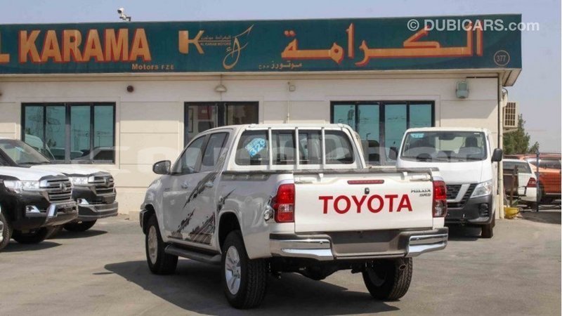 Big with watermark toyota hilux bumthang import dubai 2669