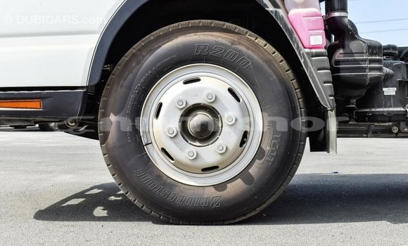 Buy Import Mitsubishi Carisma White Car in Import - Dubai in Bumthang