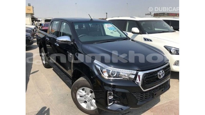 Big with watermark toyota hilux bumthang import dubai 2736