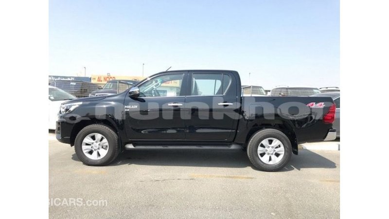 Big with watermark toyota hilux bumthang import dubai 2736