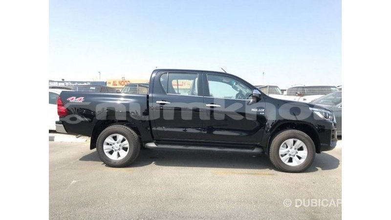 Big with watermark toyota hilux bumthang import dubai 2737