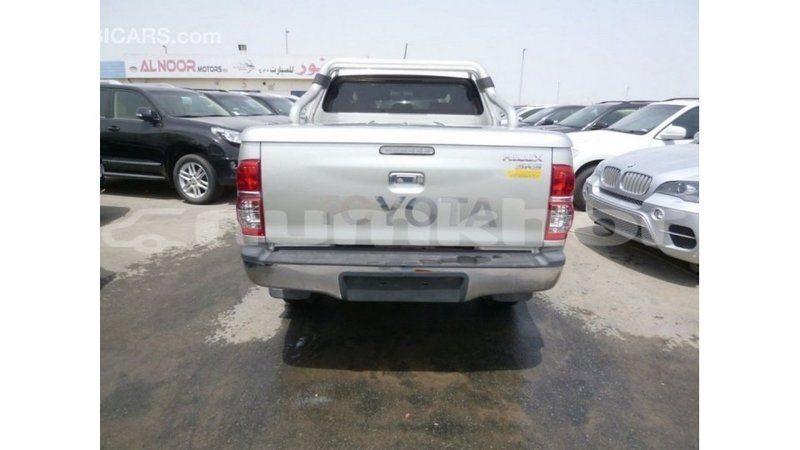 Big with watermark toyota hilux bumthang import dubai 2823