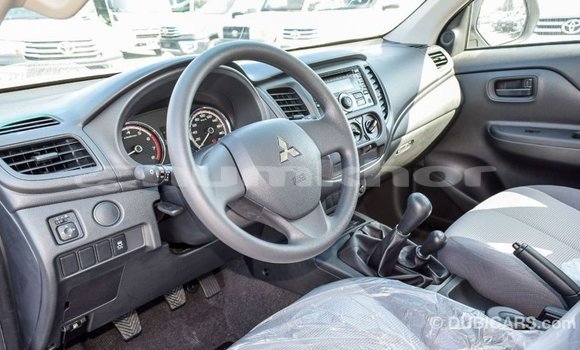 Buy Import Mitsubishi L200 White Car in Import - Dubai in Bumthang Buy Import Mitsubishi L200 White Car in Import - Dubai in Bumthang