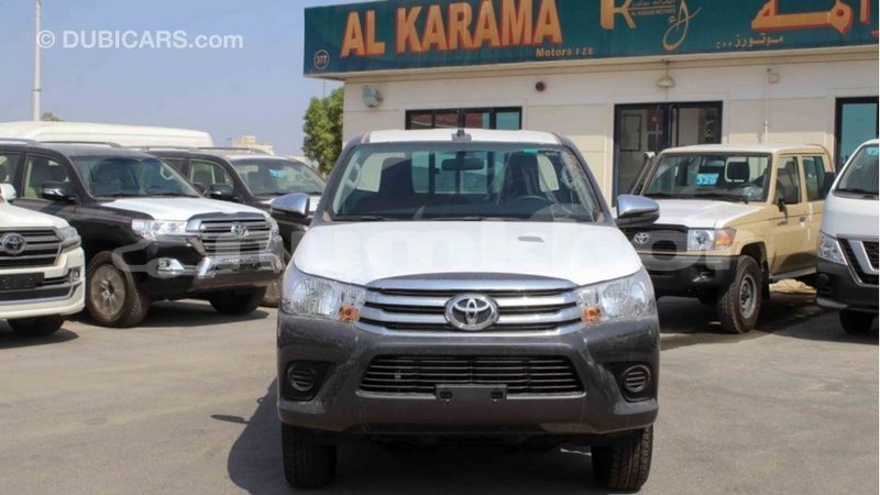 Big with watermark toyota hilux bumthang import dubai 2956