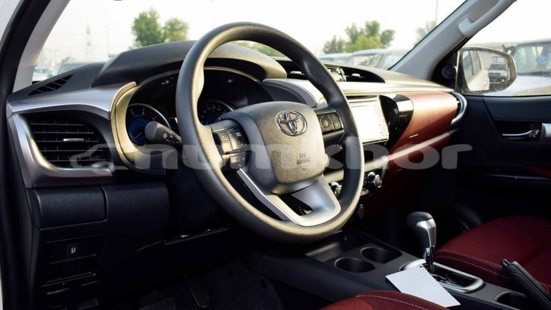 Big with watermark toyota hilux bumthang import dubai 2964