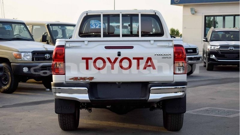 Big with watermark toyota hilux bumthang import dubai 2964